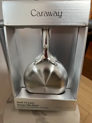 Customer-uploaded image. Click to see more details. The image represents: Caraway brand stainless steel mini fry pan in retail packaging, displayed in a white box with product information visible on the front.