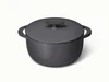 Caraway 6.5 qt enameled cast iron Dutch oven in Charcoal with a matching lid.