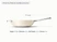 Caraway Cream ceramic stir fry pan dimensions. length: 21 in; diameter: 12 in; wall height: 4.2 in; capacity: 4 qt.