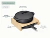 Caraway Charcoal braiser, skillet with storage organizers shown in a labeled size and contents guide.
