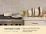 Caraway Cream ceramic cookware on a stove and in organizers; ceramic coating made without PTFE, PFOA, PFAS, lead, or cadmium.