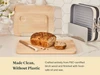Caraway wooden cutting boards displayed beside sliced bread and organized cookware.