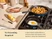 Caraway navy enameled cast iron mini skillet cooking an egg beside a larger skillet of potatoes.