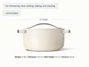 Caraway Cream ceramic Dutch oven dimensions. length: 13 in; diameter: 10.5 in; wall height: 6.7 in; capacity: 6.5 qt.