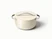 Caraway ceramic Dutch oven in Cream with a matching lid.