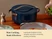 Caraway lidded Navy ceramic Dutch oven on a dining table beside other cookware and a salad.