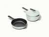 Caraway enameled cast iron mini duo in pale green.