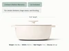 Caraway Cream enameled cast iron oval Dutch oven dimensions. length: 15.8 in; width: 10.5 in; wall height: 7 in; capacity: 8.5 qt.