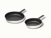 Caraway enameled cast iron skillet duo in Cream.