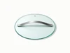 Caraway large clear glass cookware lid with a silver-tone handle, viewed at an angle.