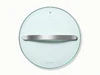 Caraway 12-inch glass cookware lid with silver-tone handles.