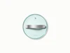 Caraway 6-inch glass cookware lid with silver-tone handles.