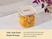 Caraway medium glass airtight container filled with pasta and topped with a Cream lid.