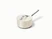 Caraway ceramic mini sauce pan in Cream with a matching lid.