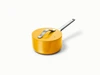Caraway ceramic mini sauce pan in Marigold with a matching lid.