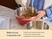 Person using an electric hand mixer in a Perracotta mixing bowl.