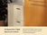 Caraway cream two-drawer recycling bin tucked beside cabinetry.