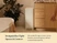 Caraway slim Cream trash can tucked beside kitchen cabinetry.