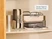 Caraway cream Squareware pans and roasting rack arranged in storage organizers.