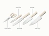 Caraway Cream kitchen knives and shears shown with component labels.