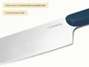 Caraway close-up of a stainless steel kitchen knife blade and Navy handle.
