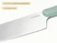 Caraway close-up of a stainless steel kitchen knife blade and Sage handle.