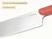 Caraway close-up of a stainless steel kitchen knife blade and Perracotta handle.
