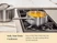 Caraway stainless steel mini sauce pan of yellow soup on a stove.
