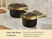 Caraway black ceramic cookware with gold-tone steamer inserts and lids on a kitchen counter.