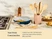 Caraway wooden cooking utensils in a holder beside a ceramic fry pan on a stove.